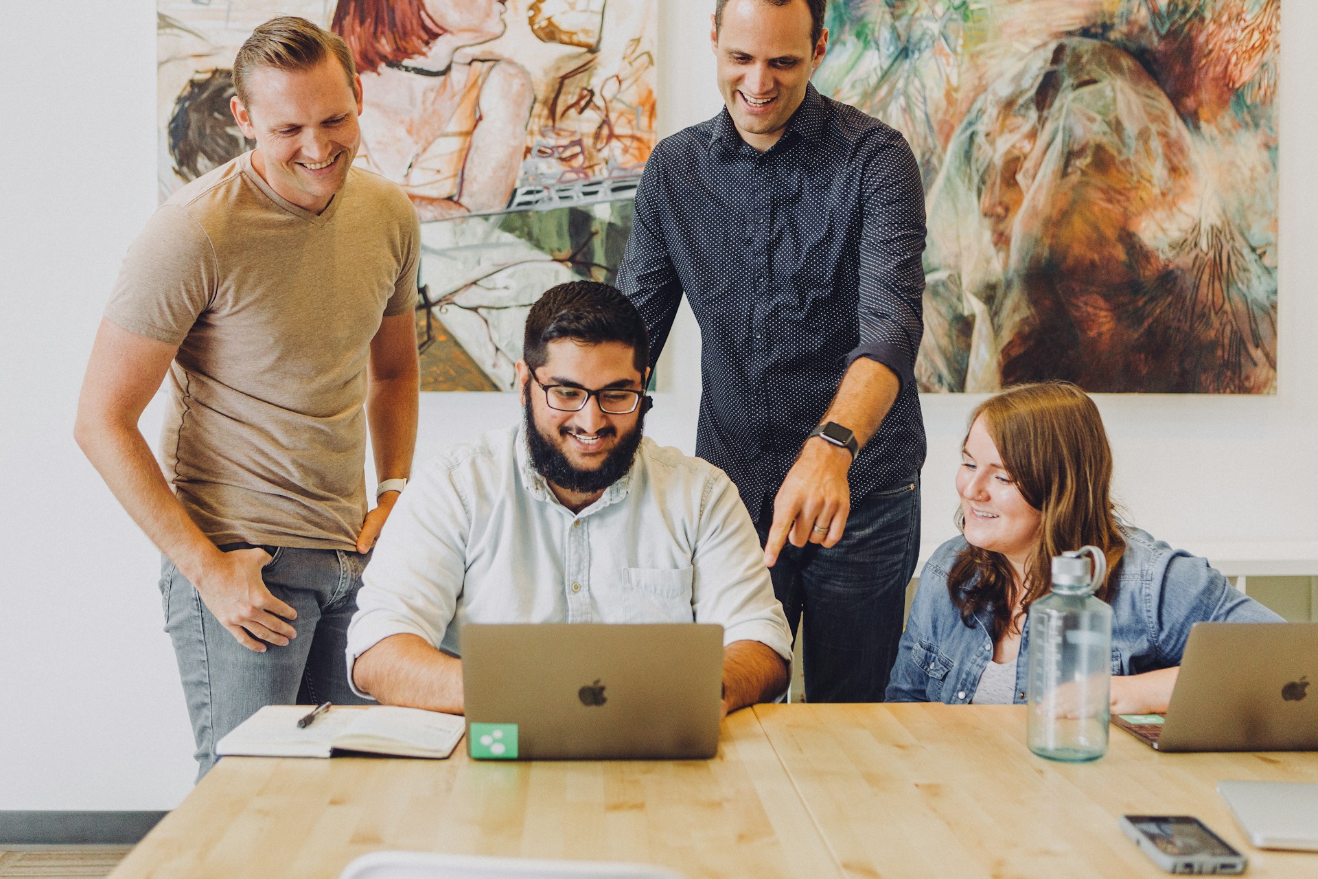 Small team collaborating in a modern office